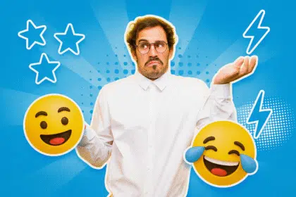 Ein Mann mit Brille und weißem Hemd steht ratlos mit hochgezogenen Schultern und verdrehten Augen in der Mitte des Bildes. Um ihn herum sind Pop-Art-Elemente wie weiße Sterne und Blitze sowie zwei große Emojis: eins grinst fröhlich, das andere lacht mit Tränen in den Augen. Der Hintergrund ist ein strahlend blauer radialer Verlauf mit Punktmuster – wie eine Mischung aus Schulfrust, Comic und Chaos.