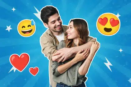Ein junges Paar umarmt sich lächelnd und schaut sich verliebt an; um sie herum sind Herz- und Emoji-Symbole mit Herzaugen und lachendem Gesicht auf blauem, grafischem Hintergrund zu sehen.