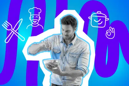 Ein Mann bereitet konzentriert einen Salat zu – Kochen kann eben auch Männersache sein.