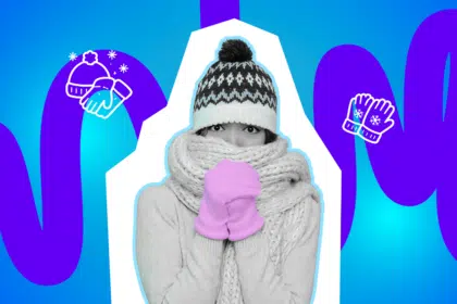 Eingemummelte Person mit Mütze, Schal und Handschuhen blickt frierend in die Kamera vor einem bunten, grafischen Hintergrund mit Wintersymbolen.