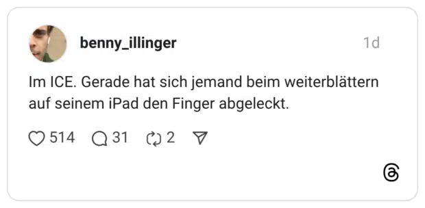 Im ICE. Gerade hat sich jemand beim weiterblättern auf seinem iPad den Finger abgeleckt.